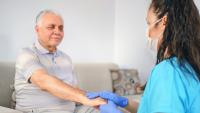Male patient consulting with doctor